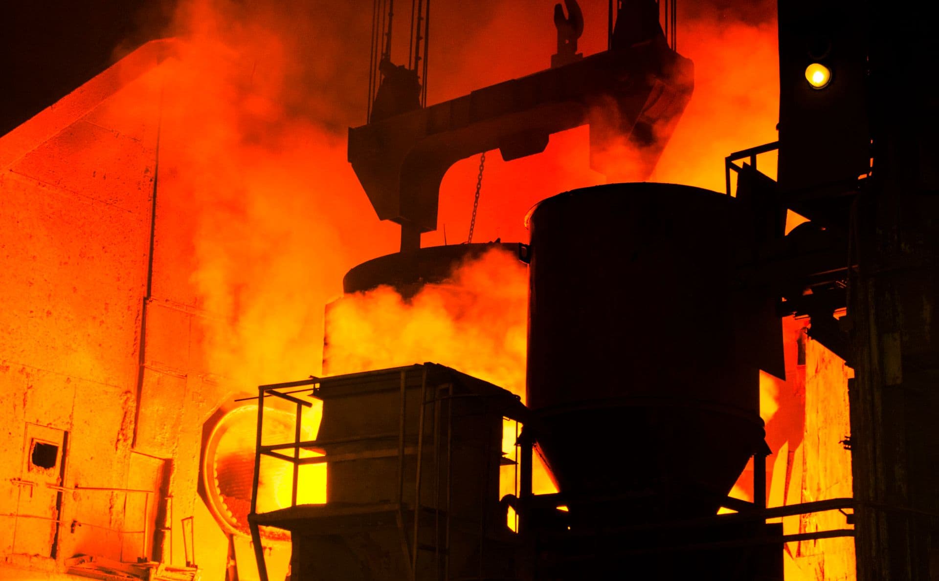Molten metal casting in an active steel mill